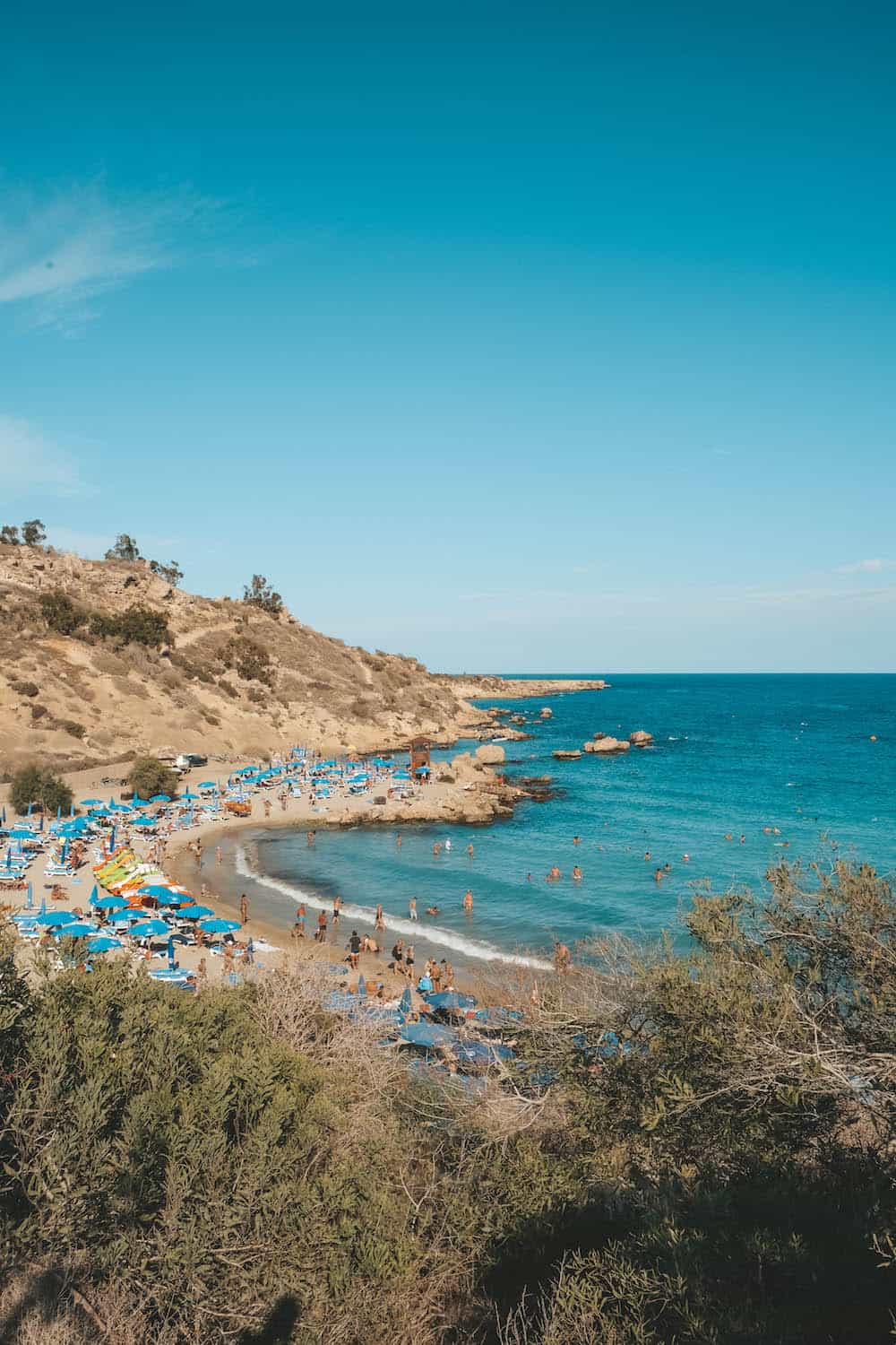 Konnos Bay Beach In Cyprus With Dozens Of Sunbathers