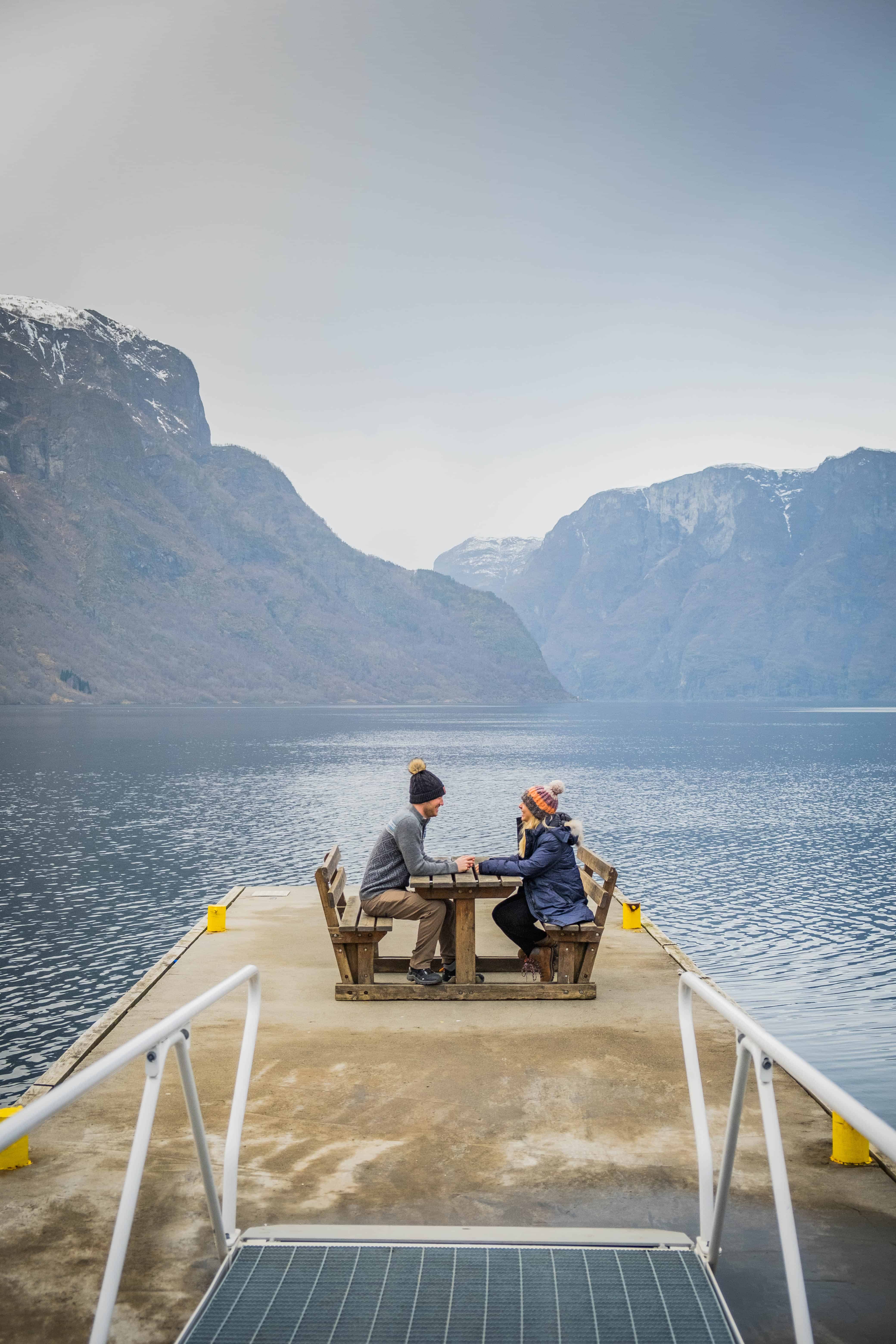 Sitting At A Picnic Table In Norway In Winter