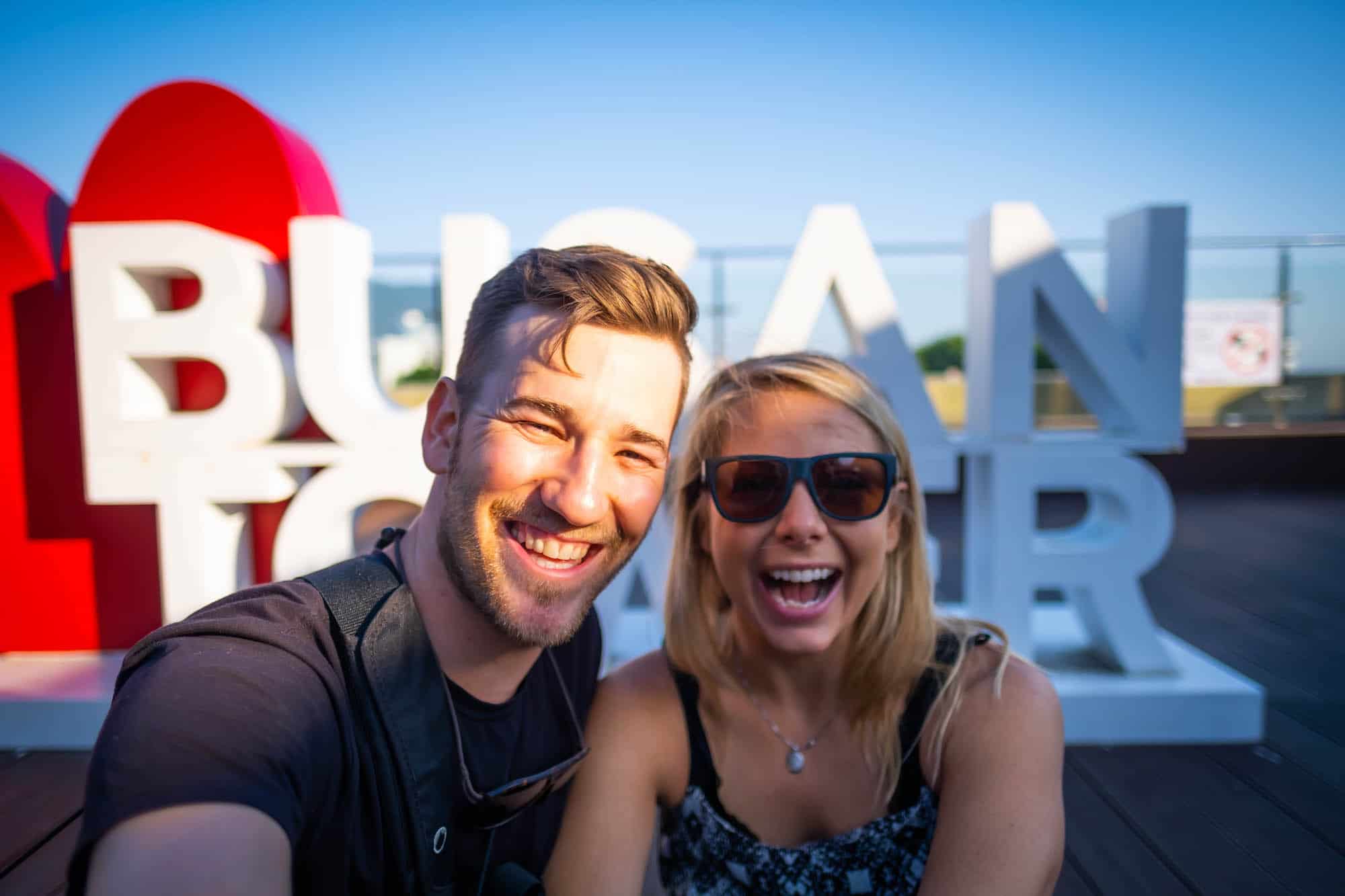 Cameron And Natasha In Front Of Busan Tower Sign