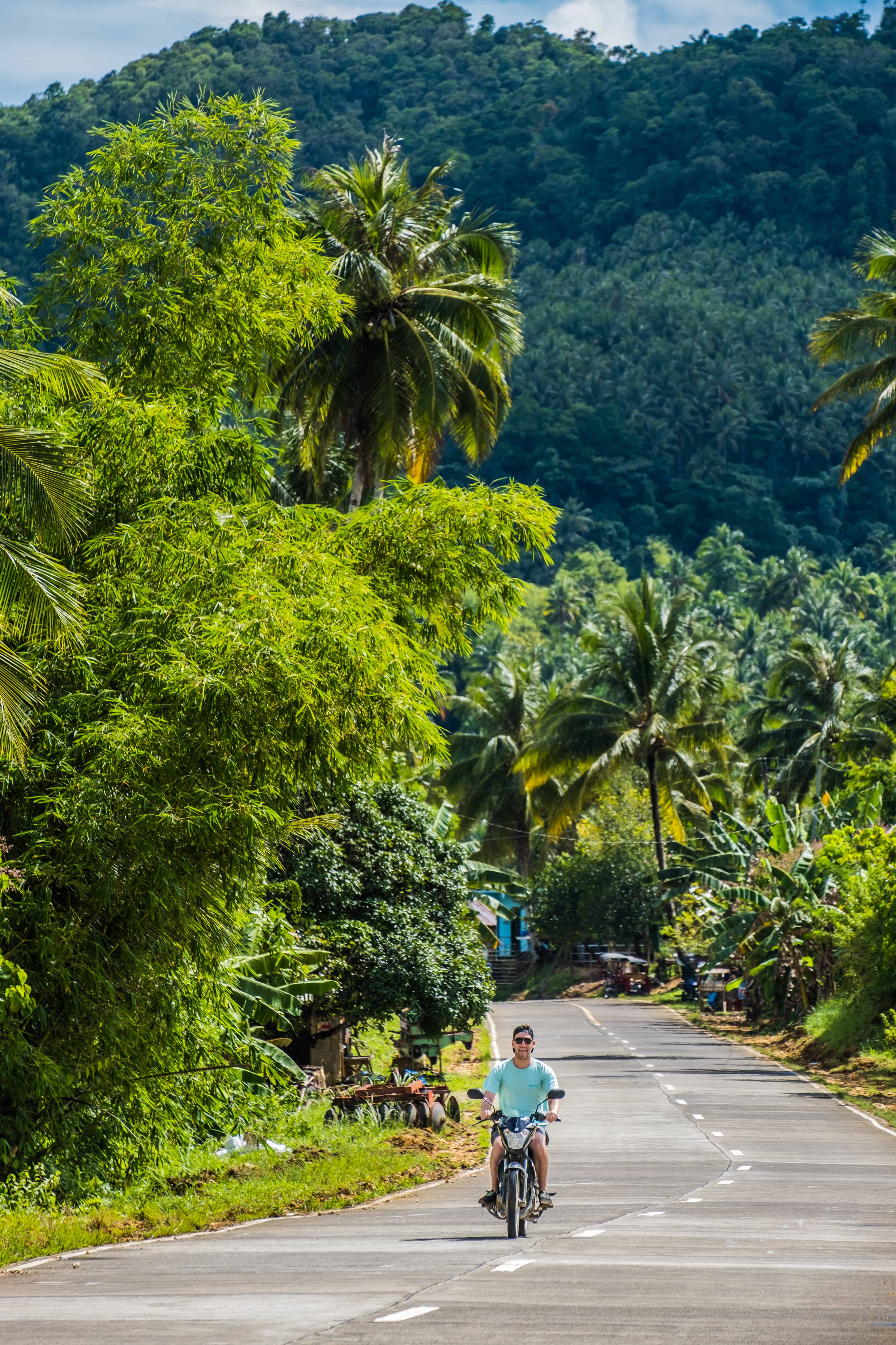 Wearing Tropicfeel Shoes While driving a motorbike in Siargao