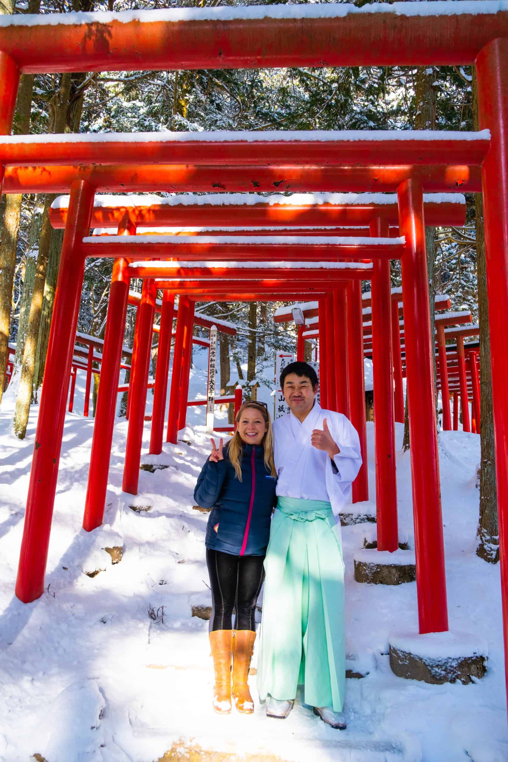 At A Temple In Japan, A Bunch Of Torii Behind