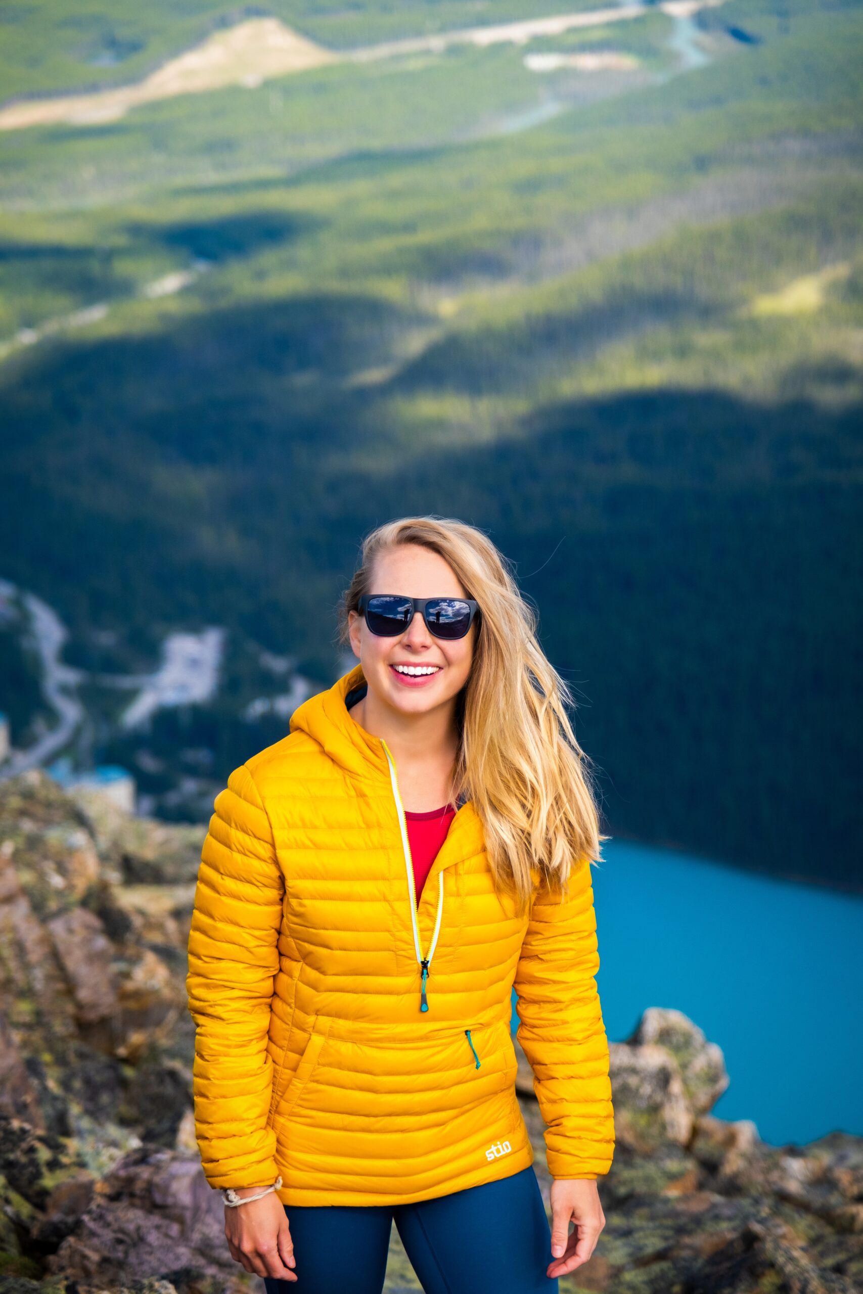 Natasha on Mt St Piran in Pinion Down Jacket