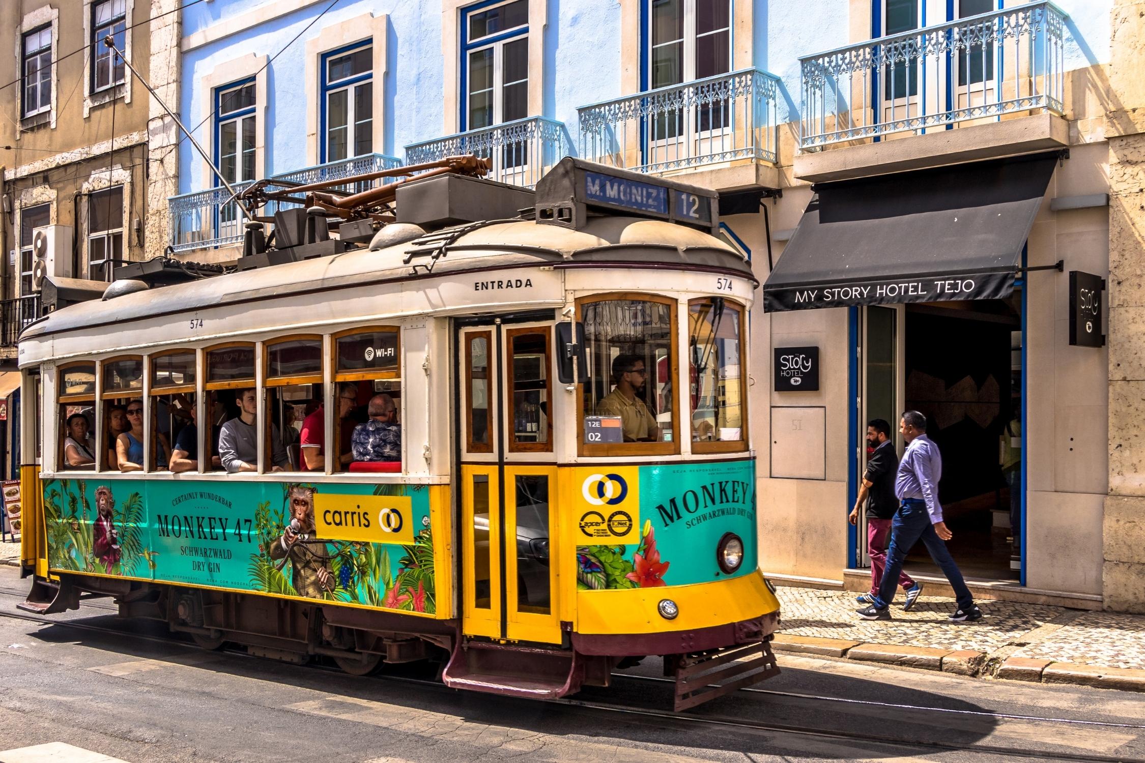 Tram in Lisbon Portgual With Locals In Jeans