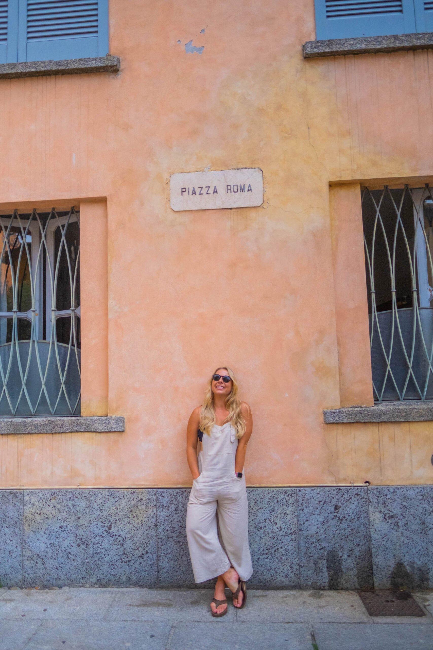 Natasha In A Town Along Lake Como in Overalls